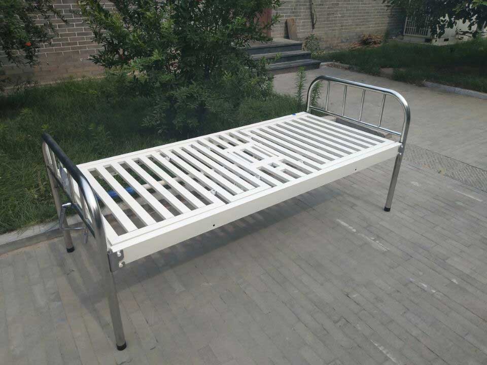 半岛.体育平板床的扶手和桌脚用半岛.体育圆管做的